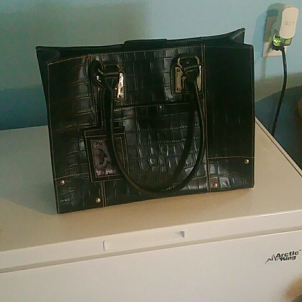Wilson leather tote bag/lap top carrier.
